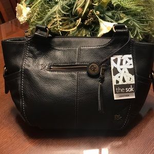 New the sak black leather purse